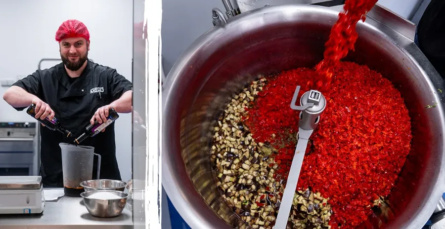 kuchař v profesionální kuchyni vaří jídlo