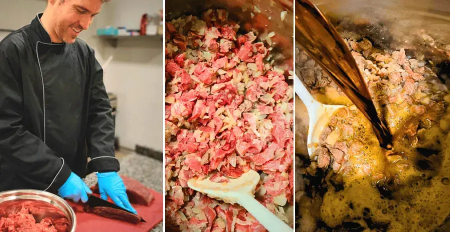 Miłosz Kubiak krájí maso v kuchyni a vaří jídla Lyommy